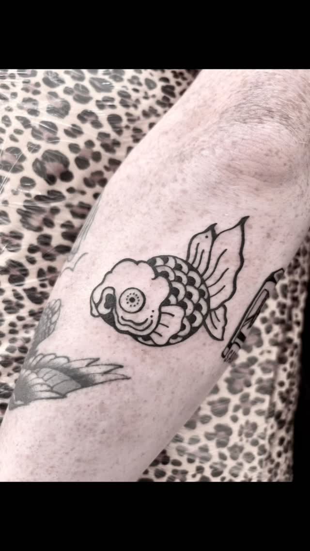 Bold Japanese koi with flowing fins, crisp linework.
