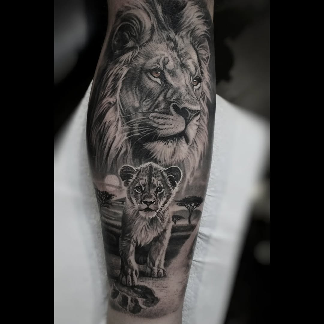 Majestic grayscale lion head with cub on savanna backdrop