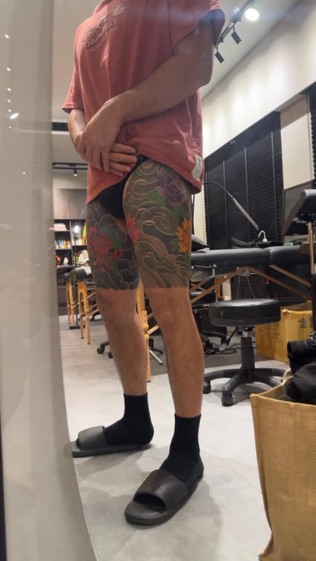 Vibrant traditional Japanese floral leg sleeve with waves