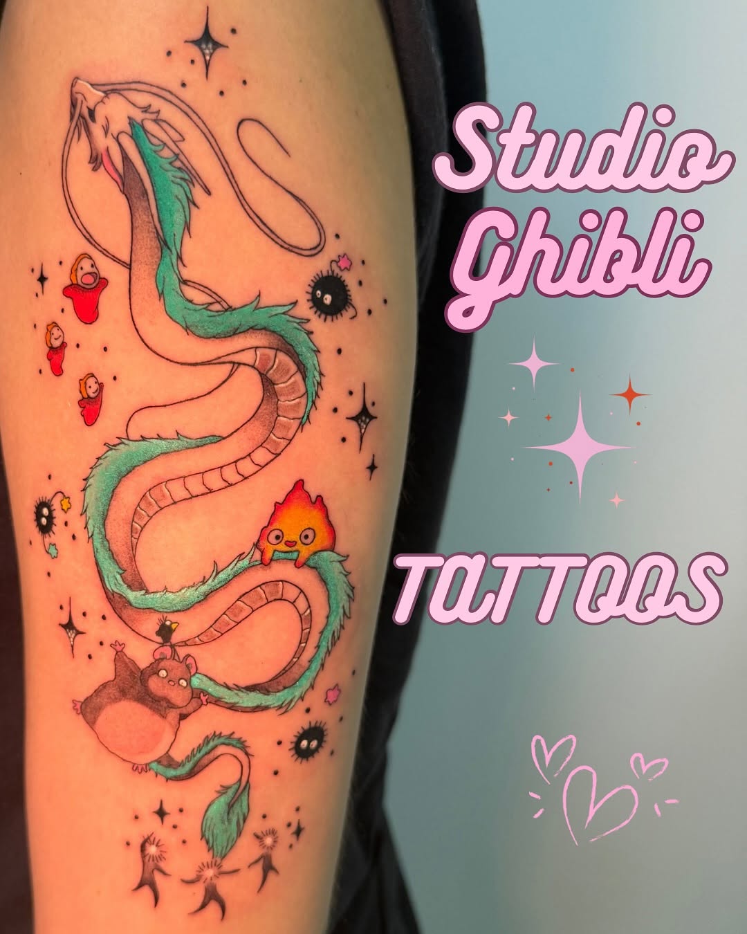 Playful teal dragon coils around leg with soot sprites