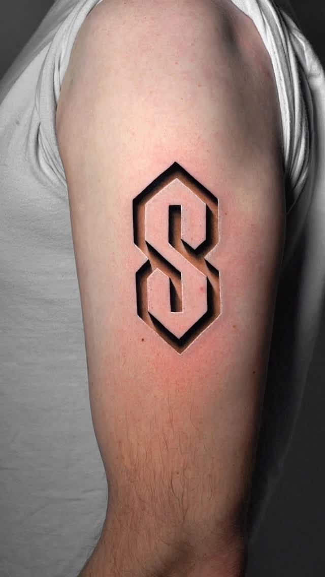 Bold geometric S monogram with angular shadowing