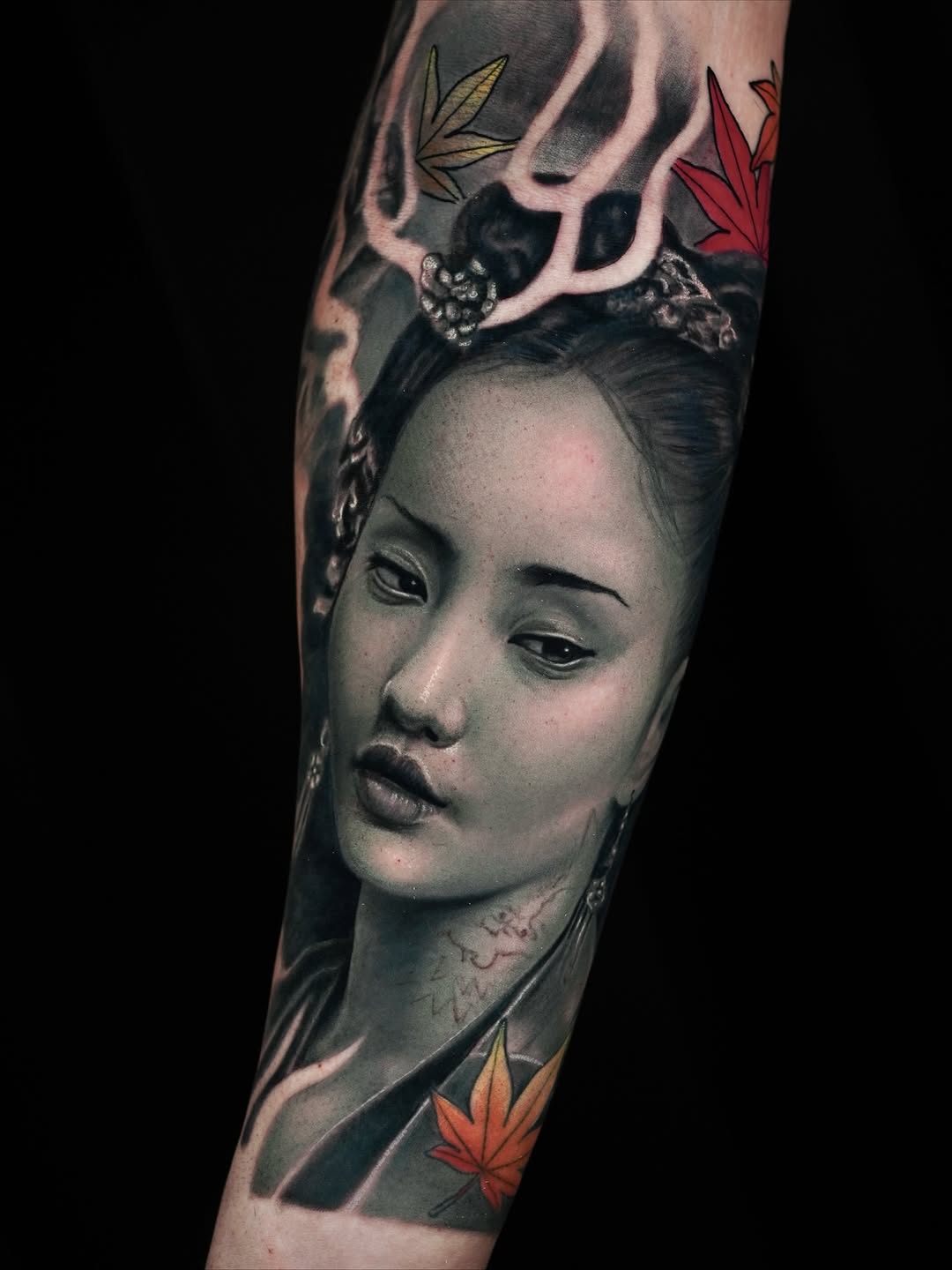 Realism portrait tattoo of a woman