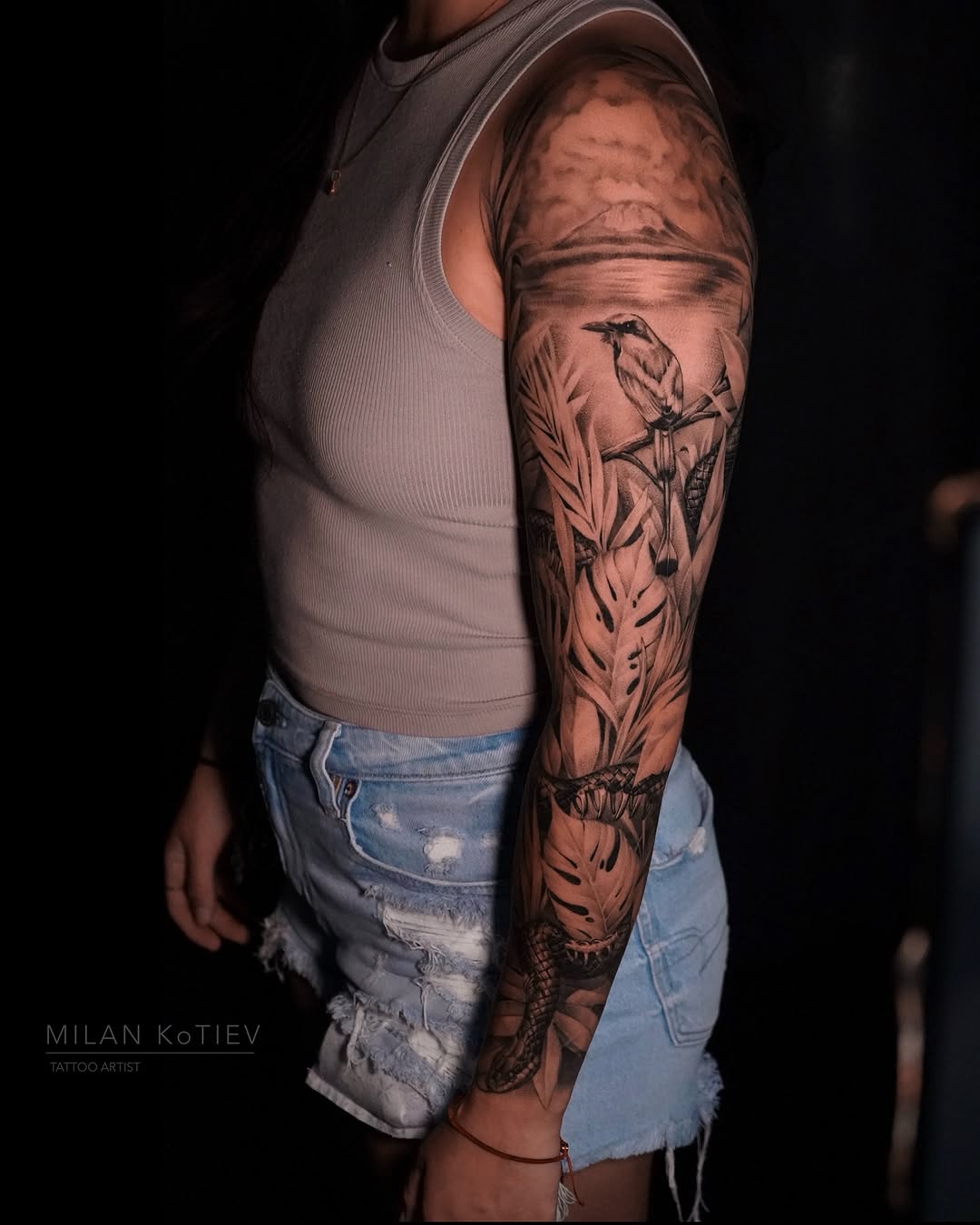 Monochrome jungle sleeve with bird, leaves, and snake