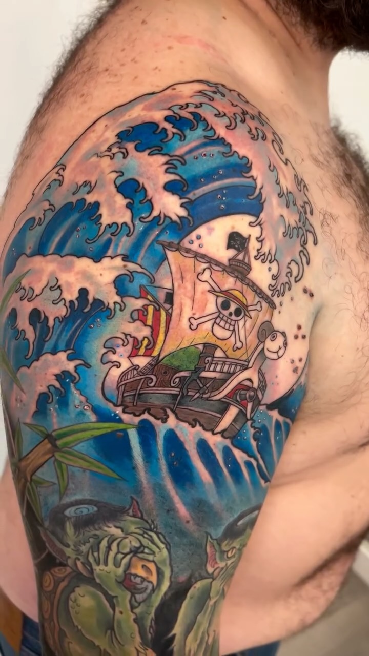 Bold Japanese-style sleeve with waves and pirate ship