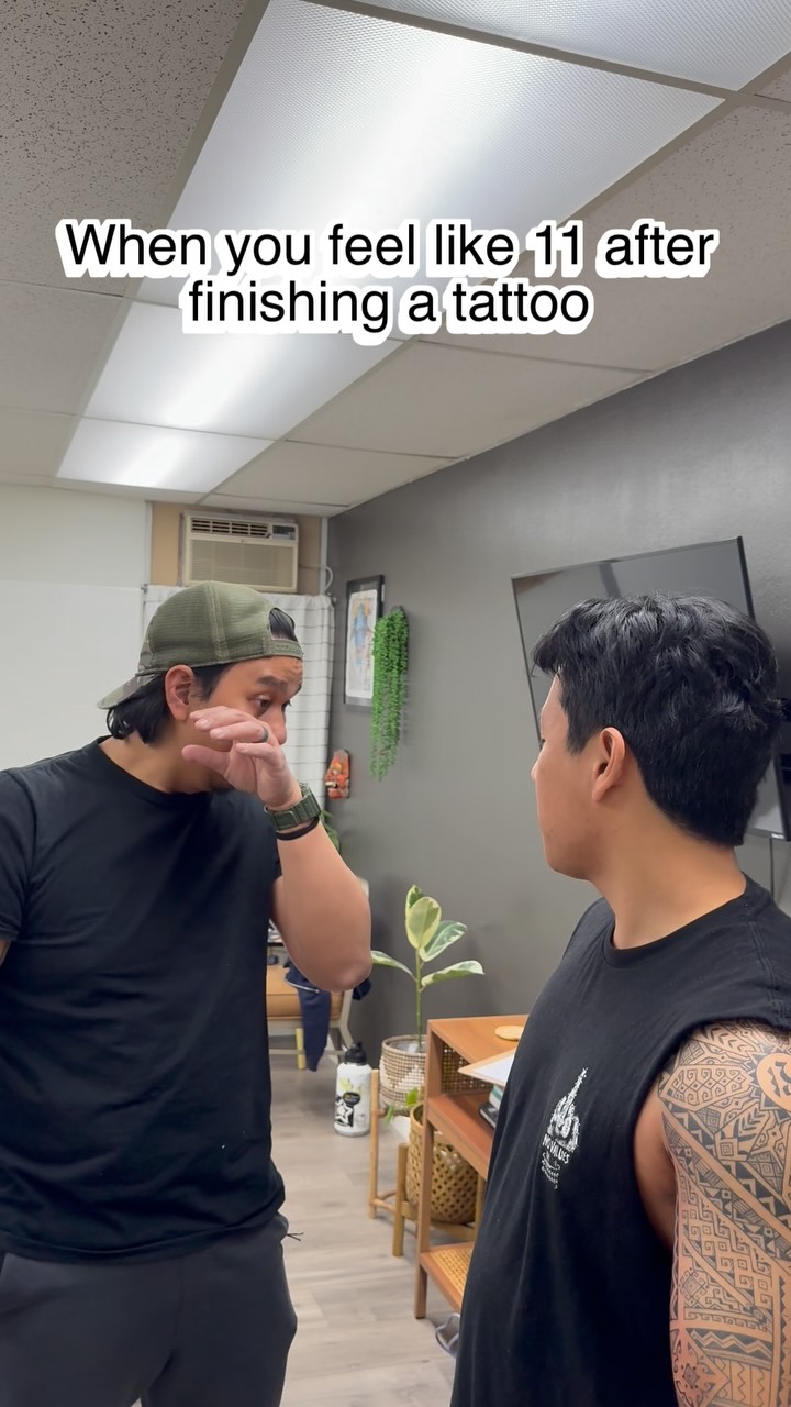 Intricate black Polynesian geometric sleeve on upper arm