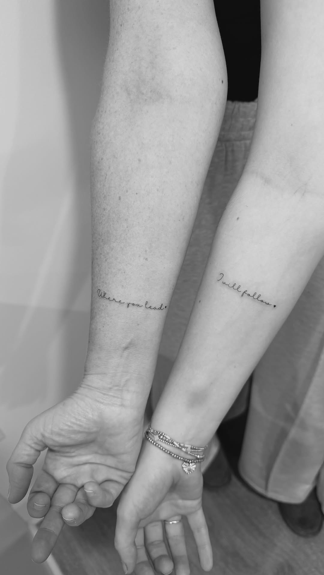 Twin minimalist cursive forearm quotes for mother-daughter