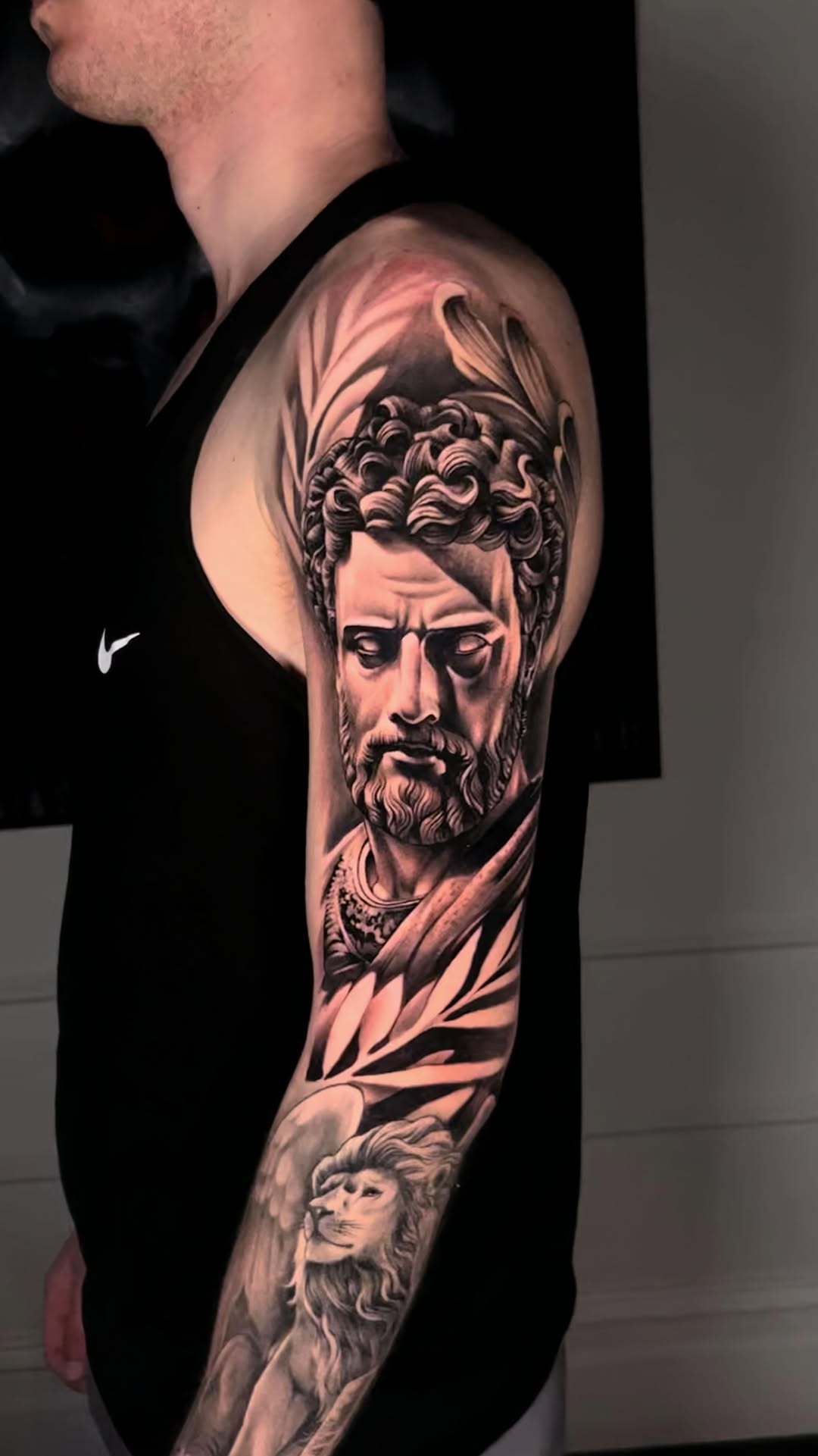 Realistic classical bust with dramatic contrast shading.