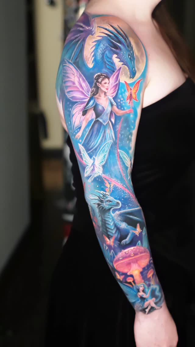 Vibrant fantasy sleeve featuring a fairy, dragon, mushrooms, butterflies