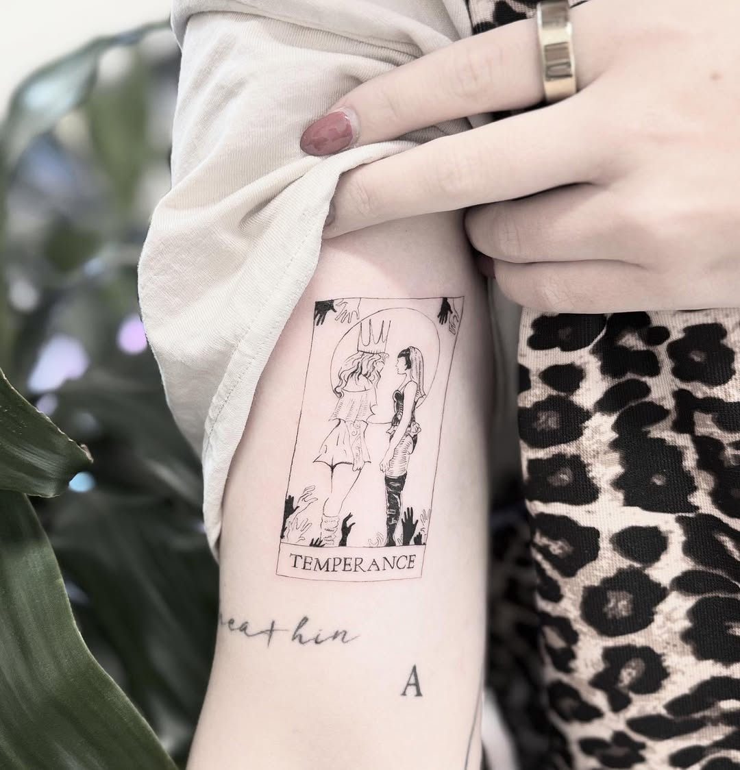 Minimalist Temperance tarot card tattoo in a framed rectangle