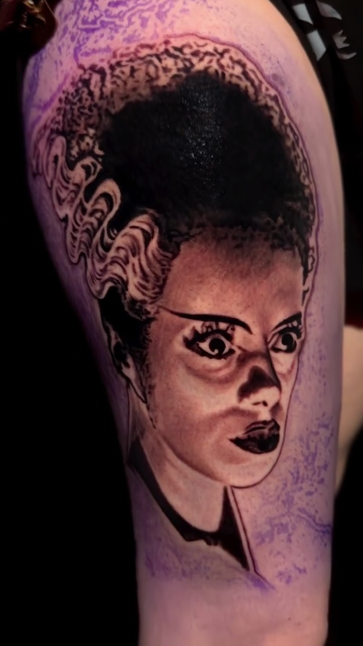 Bold black-and-gray portrait with dramatic vintage styling.