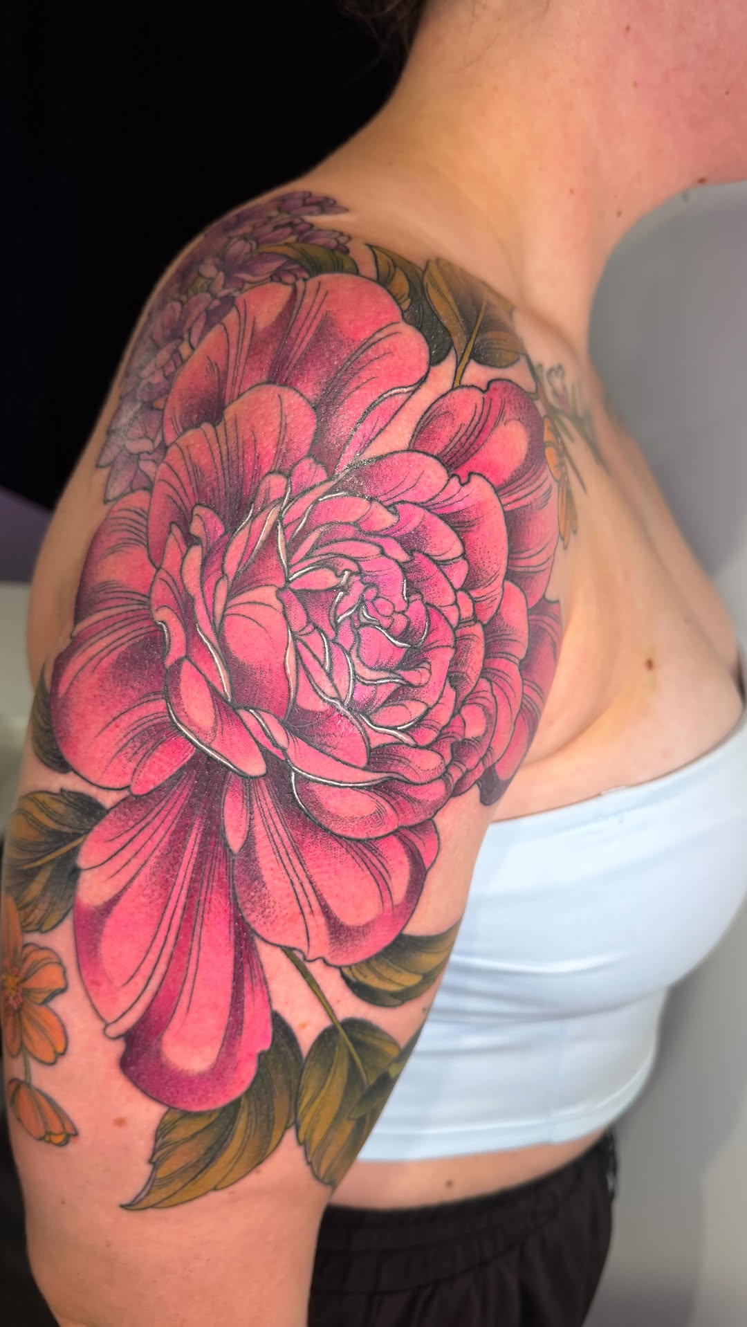 Bold neon-pink peony with lush green leaves, bold outlines