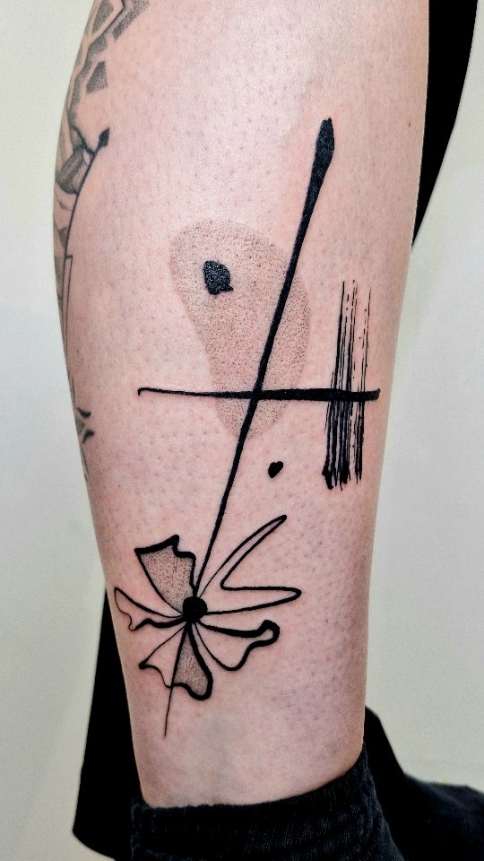 Elegant abstract linework intersecting a delicate floral silhouette.