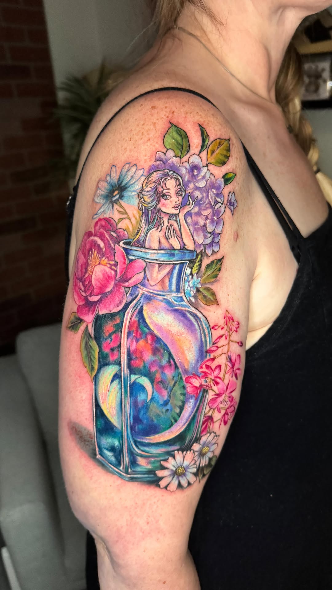 Vibrant watercolor bottle with mermaid and blooming florals