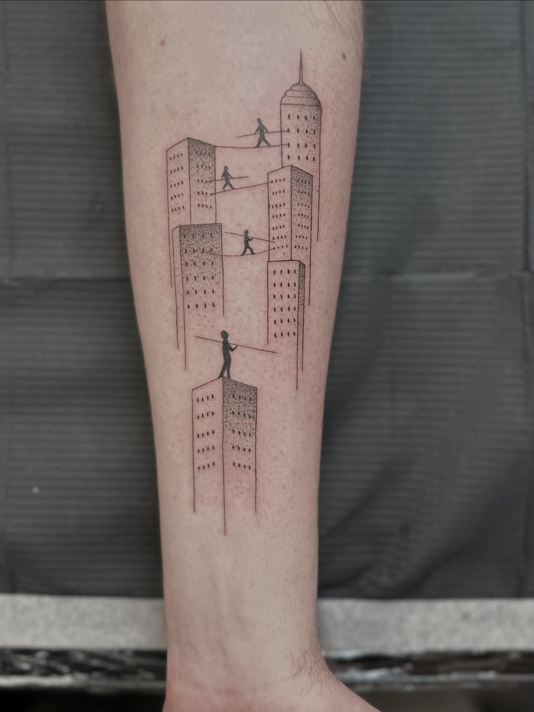 Minimalist cityscape with tiny figures walking between towers.