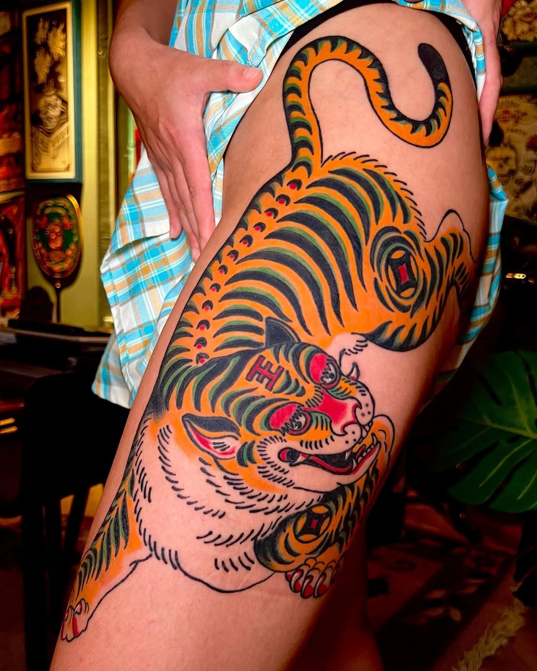 Vibrant Japanese-style tiger with bold black outlines.