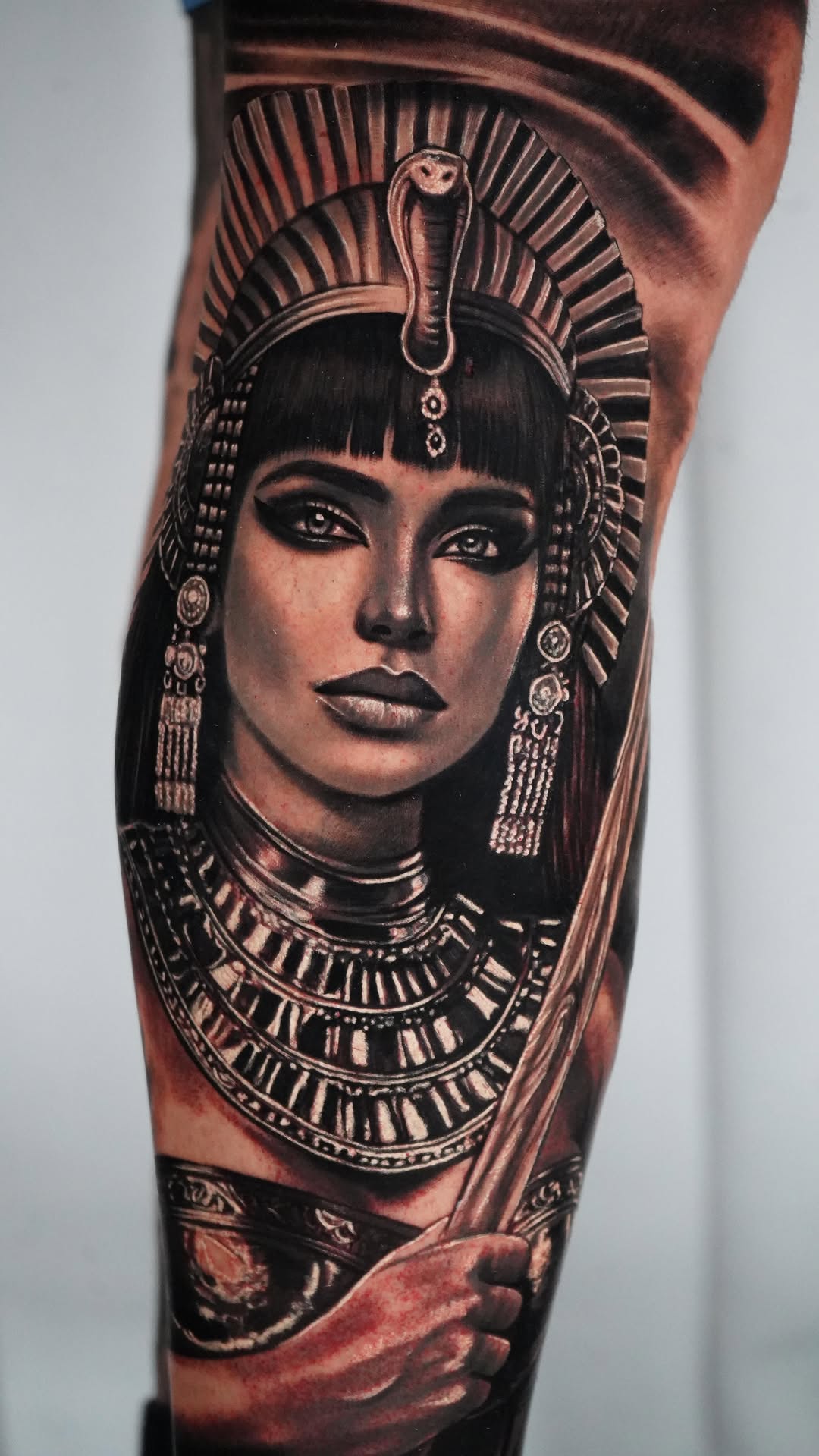 Hyper-realistic Egyptian queen portrait with ornate jewelry.
