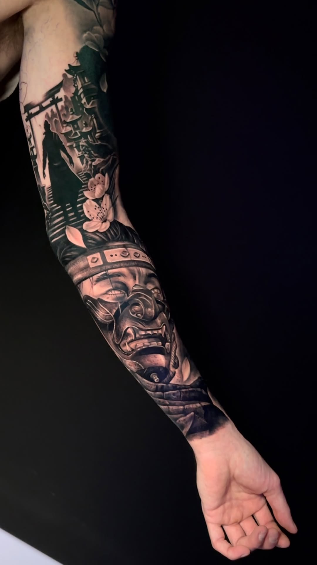 Monumental black-and-gray Japanese sleeve with samurai mask