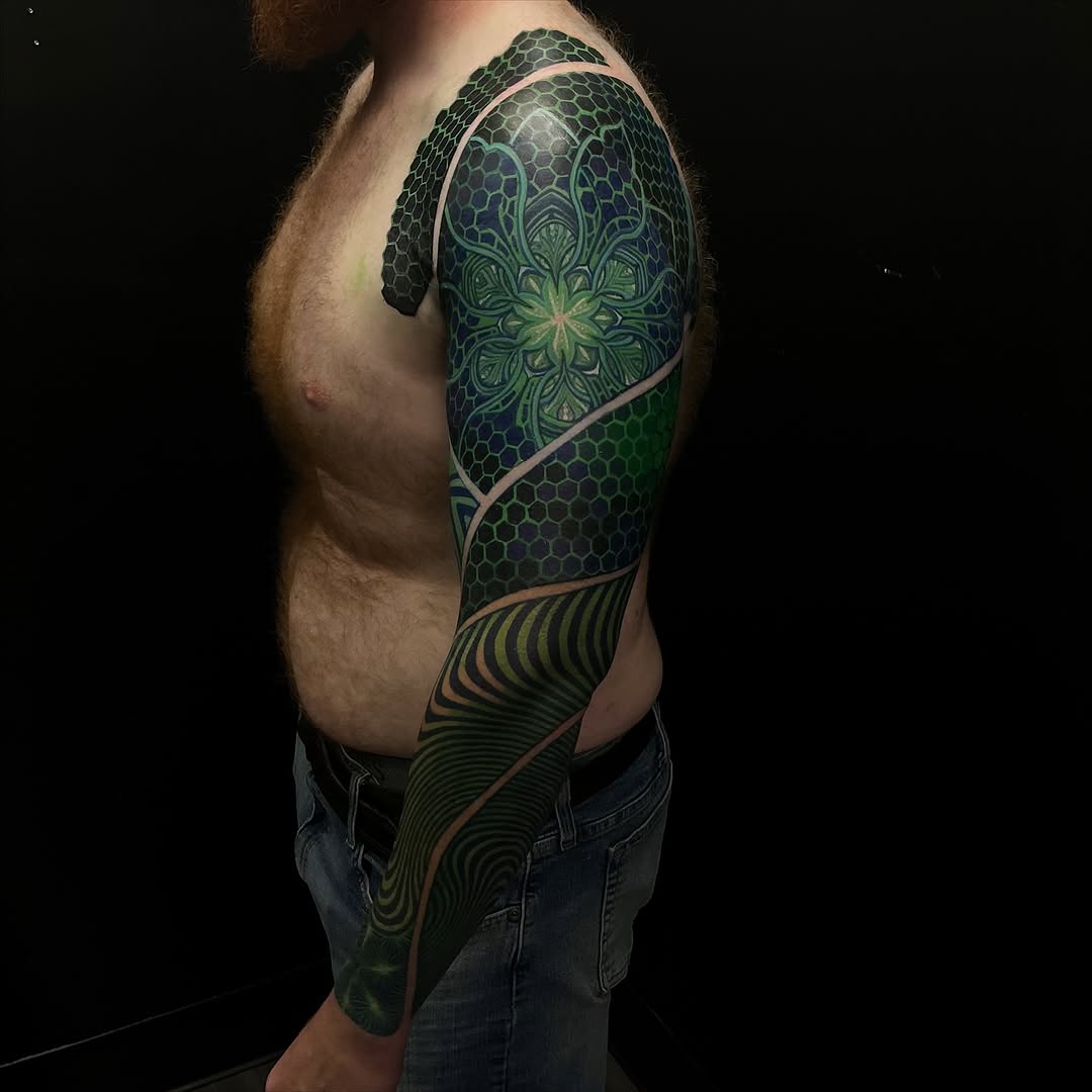 Vibrant color-geometric sleeve with hex grid and mandala bloom