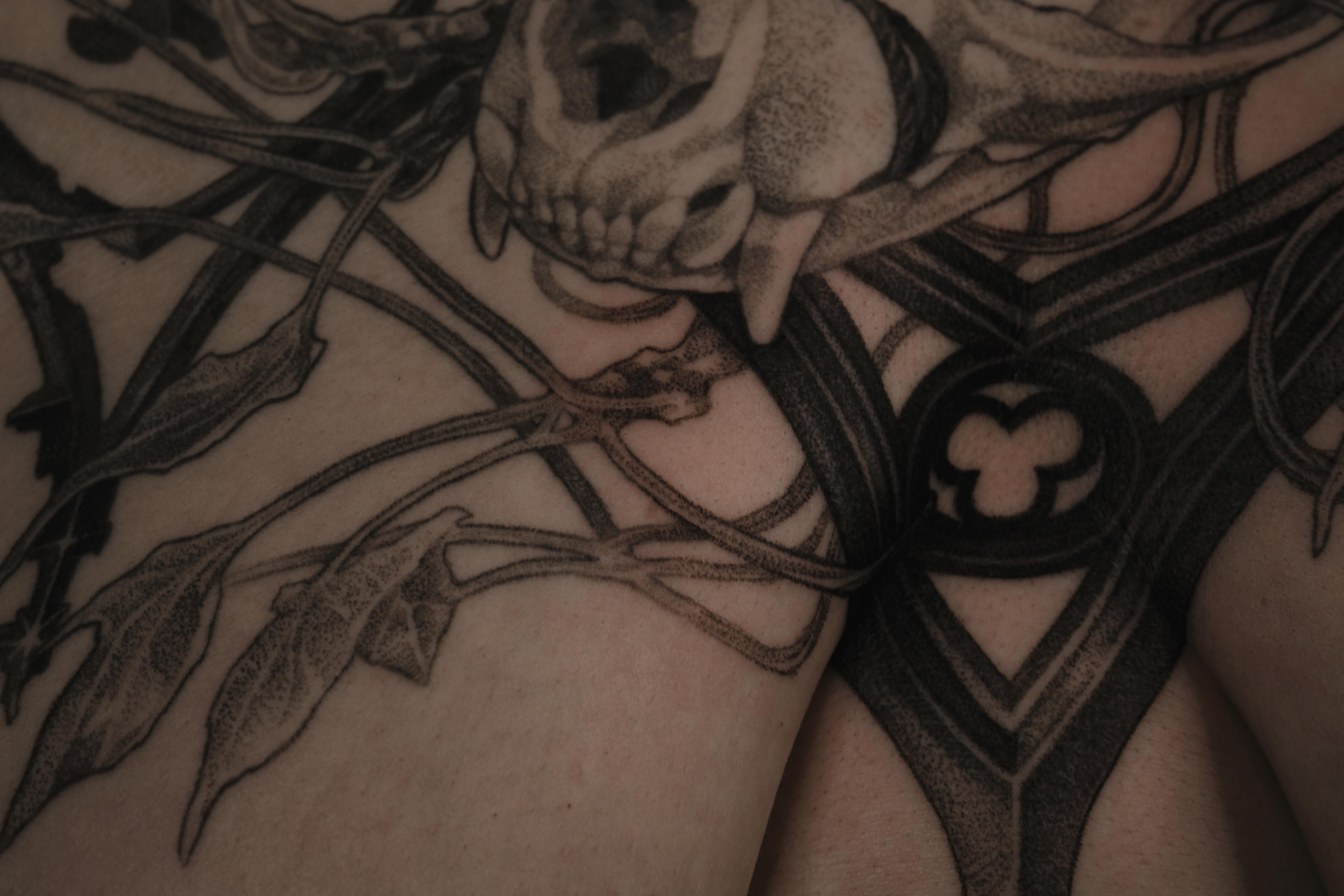 Gothic ornamental chestpiece with skull and vines