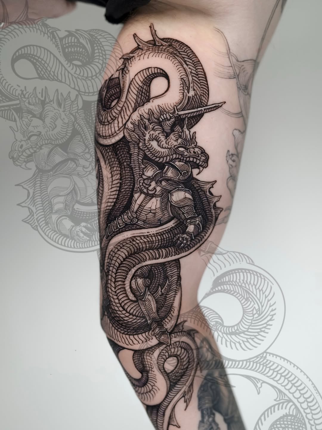 Intricate blackwork dragon entwined with armored knight