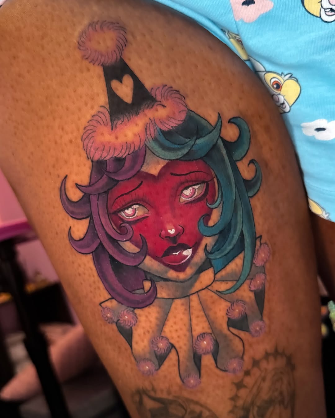 Melancholic clown-girl portrait in bold neo-traditional style