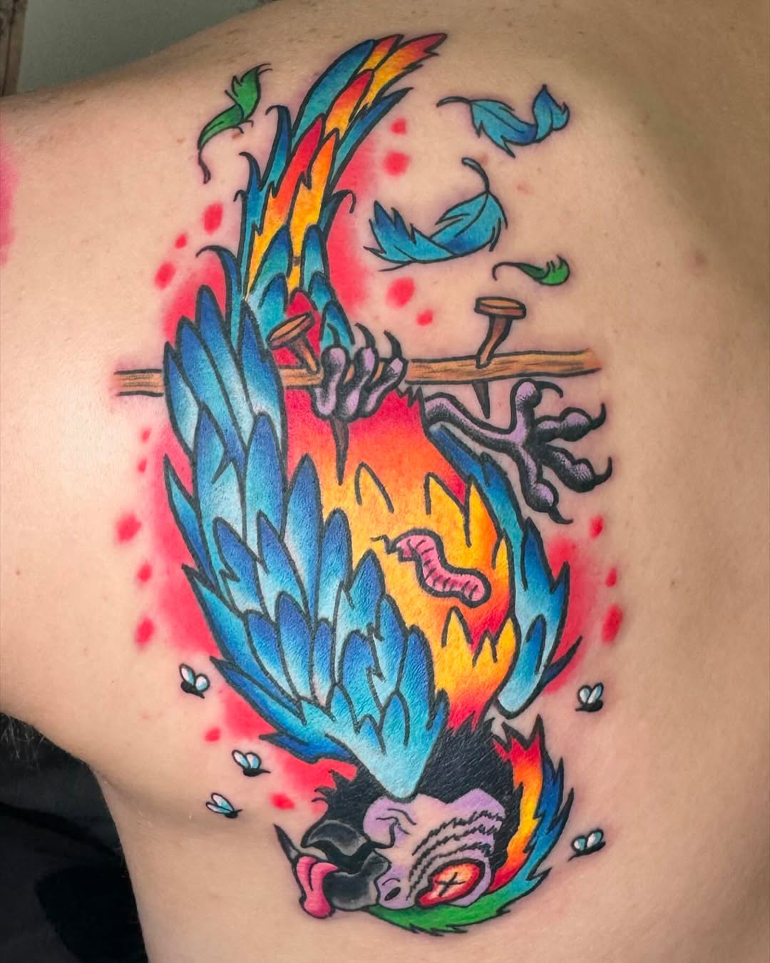 Bold neo-traditional parrot bursting with electric color