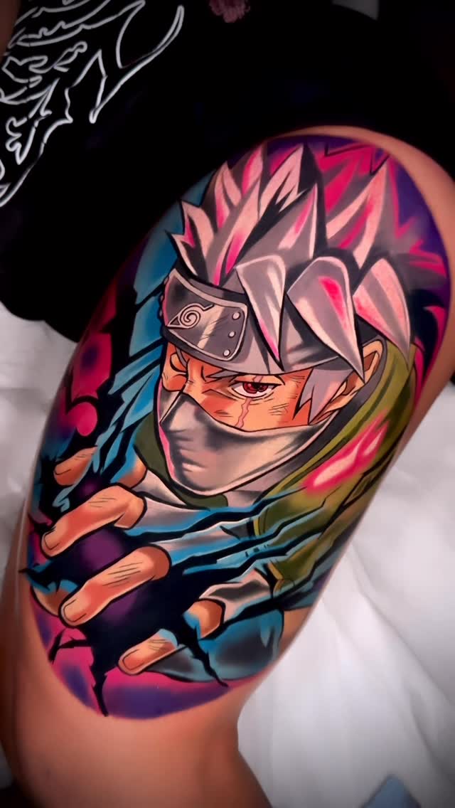 Bold neon Kakashi Naruto tattoo on outer thigh