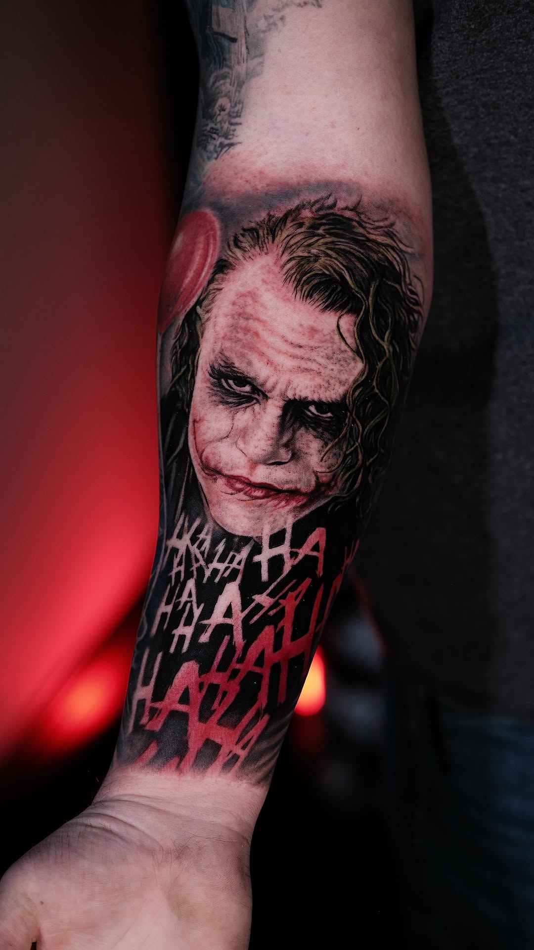 Hyper-detailed grayscale Joker portrait with chaotic HAHA lettering