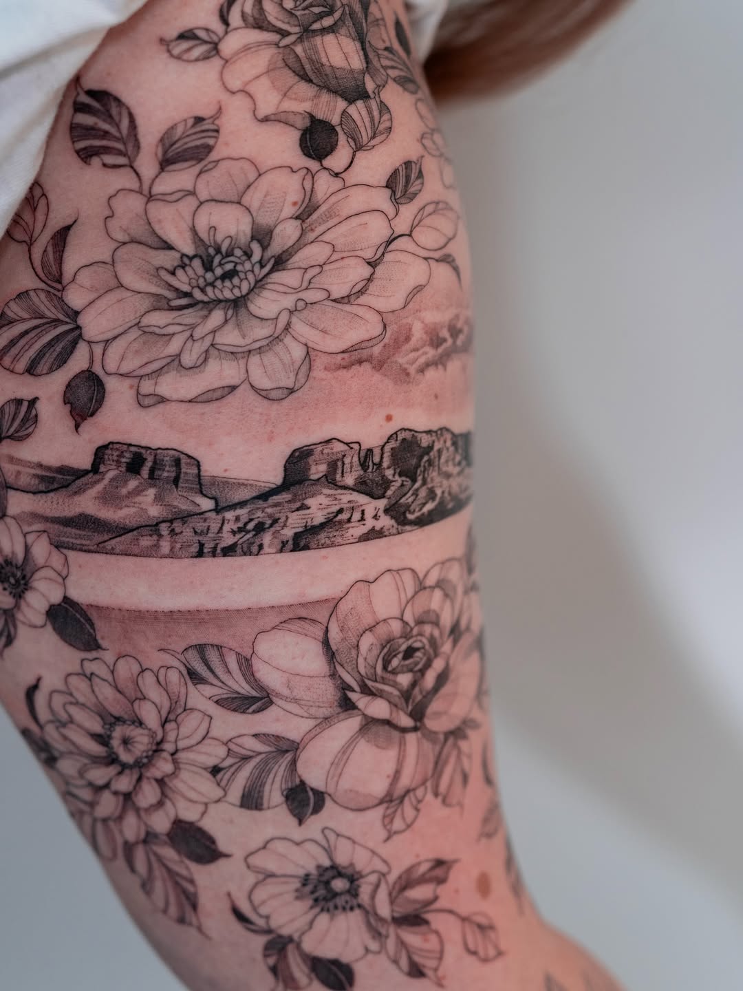 Intricate florals with a desert canyon band.