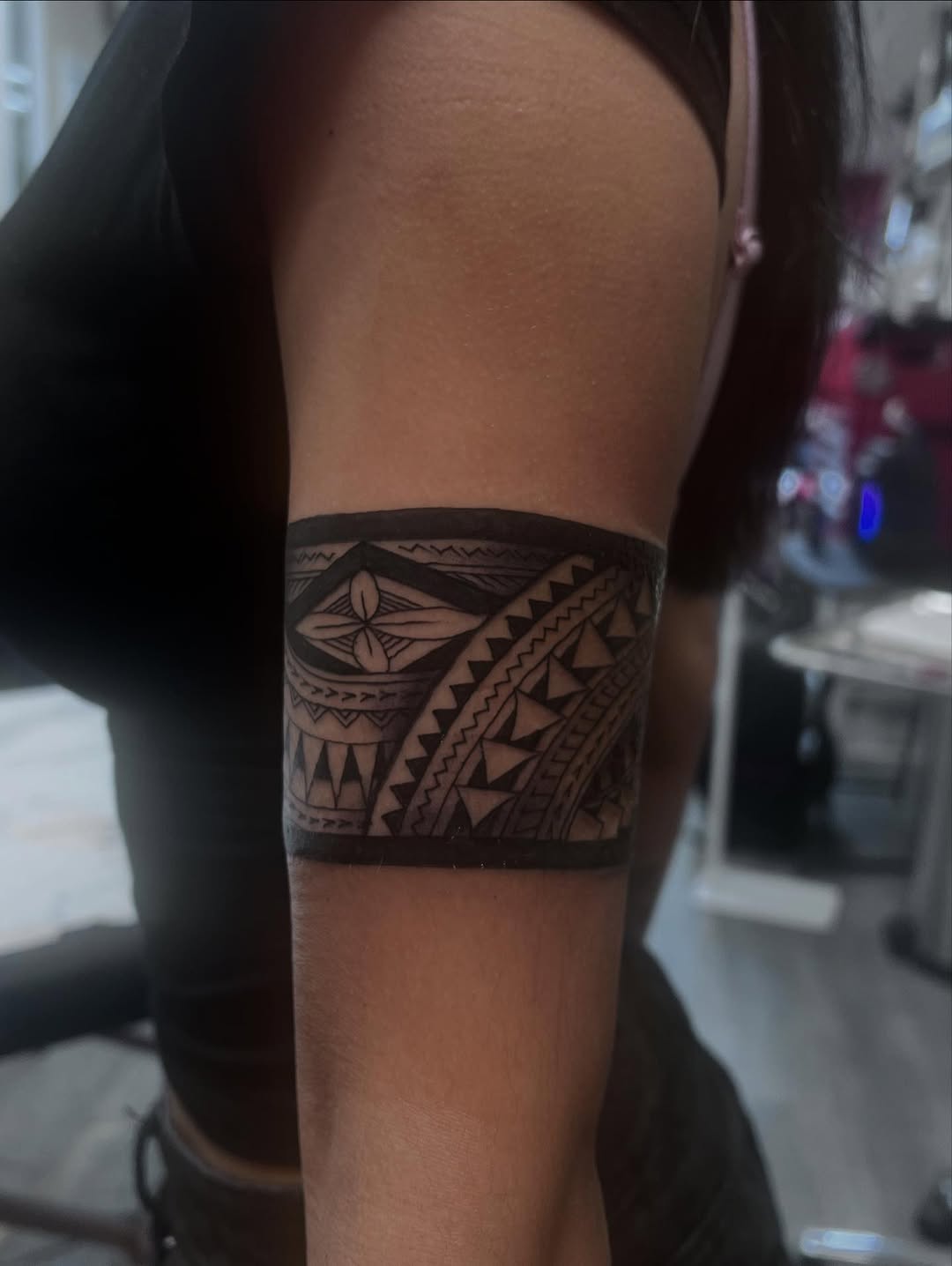 Polynesian arm band with bold geometric blackwork