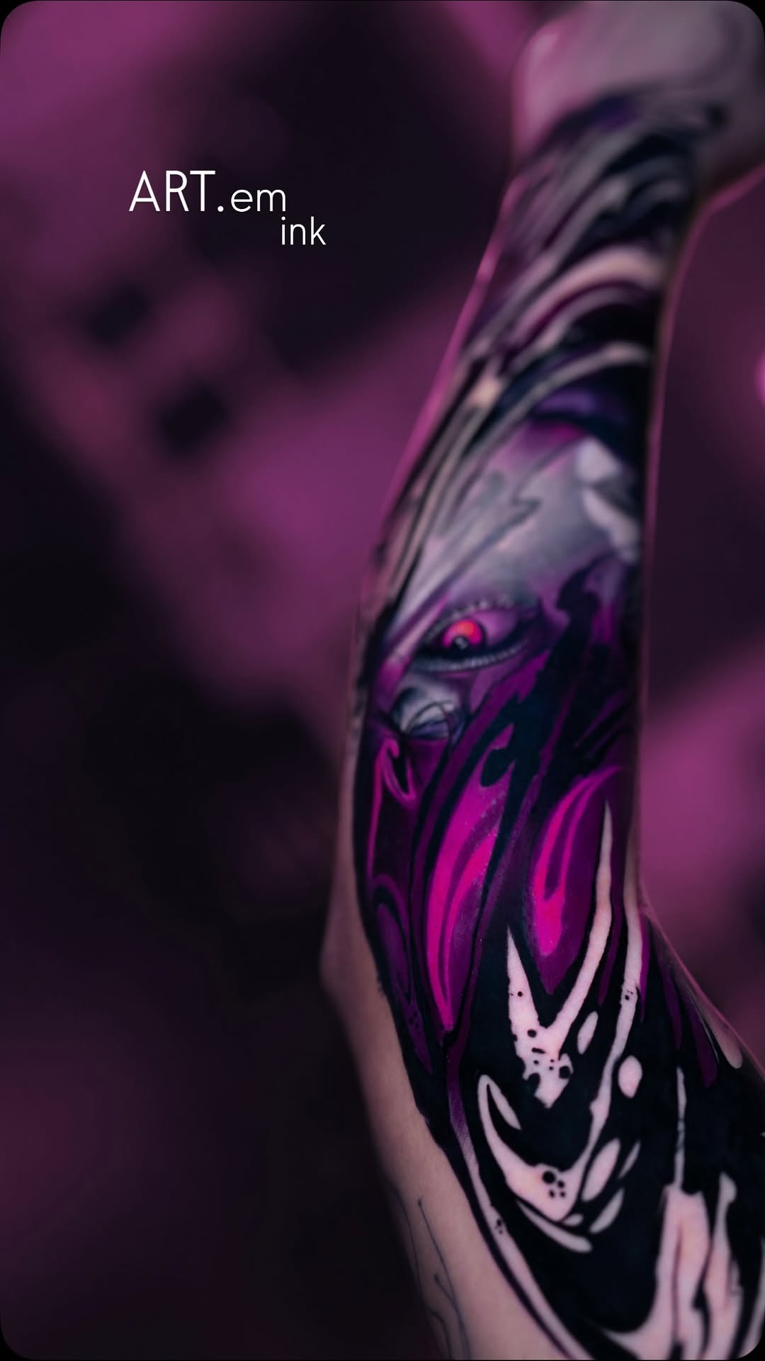 Vivid magenta-black abstract forearm sleeve with flowing shapes