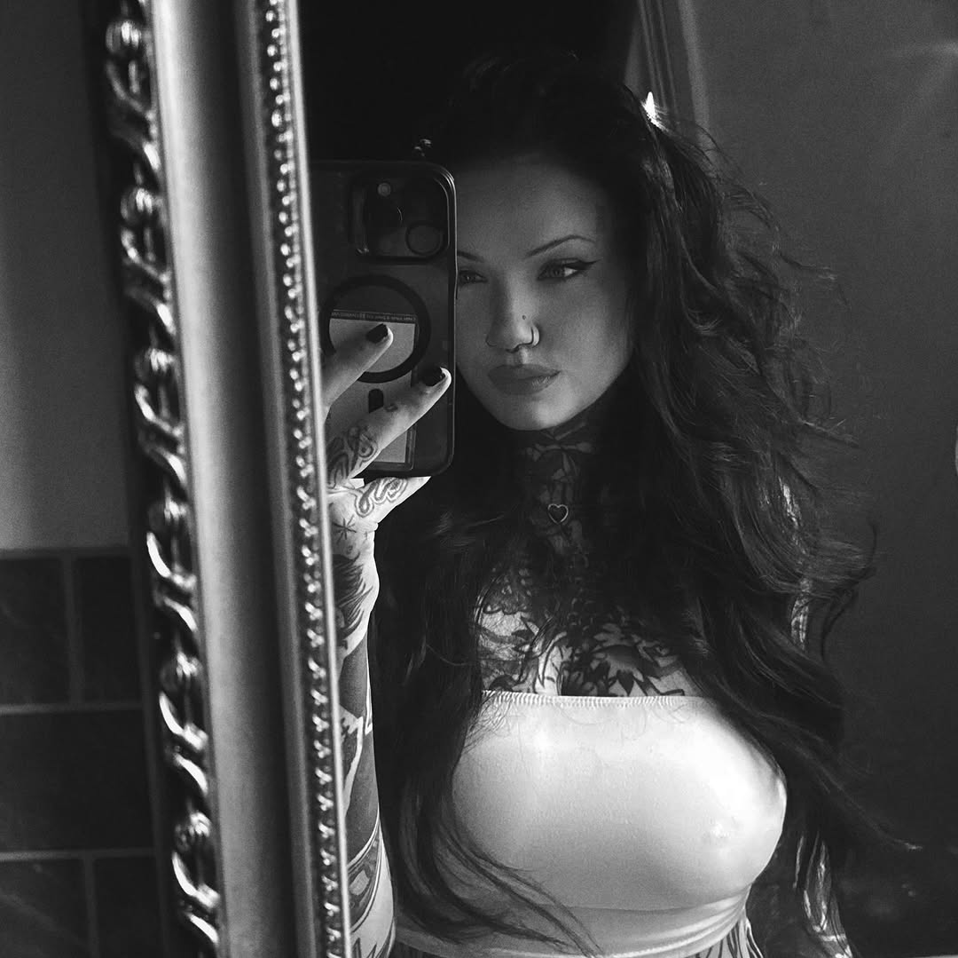 Dense blackwork floral chest and neck tattoos