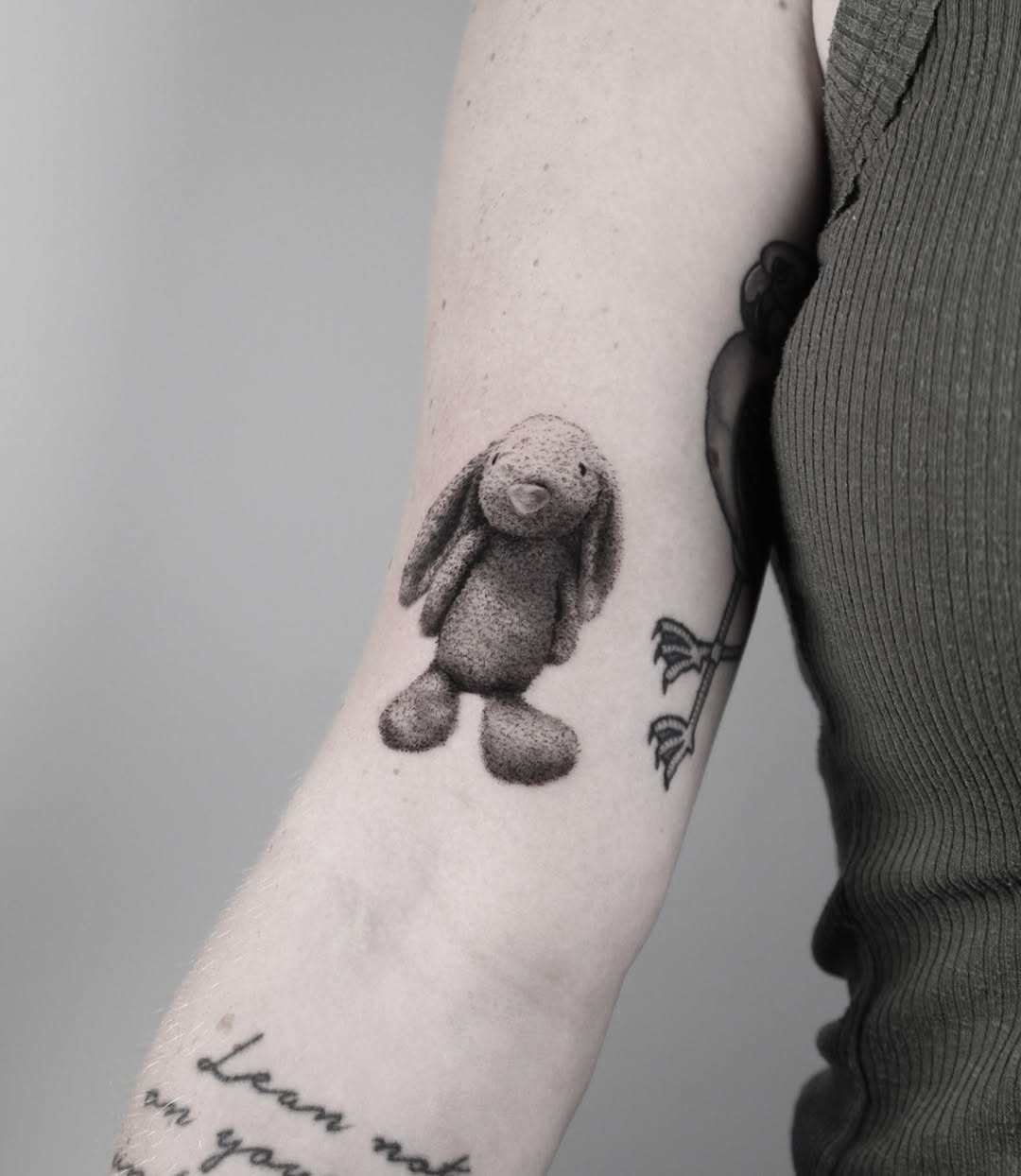Soft dotwork bunny tattoo with plush, endearing charm