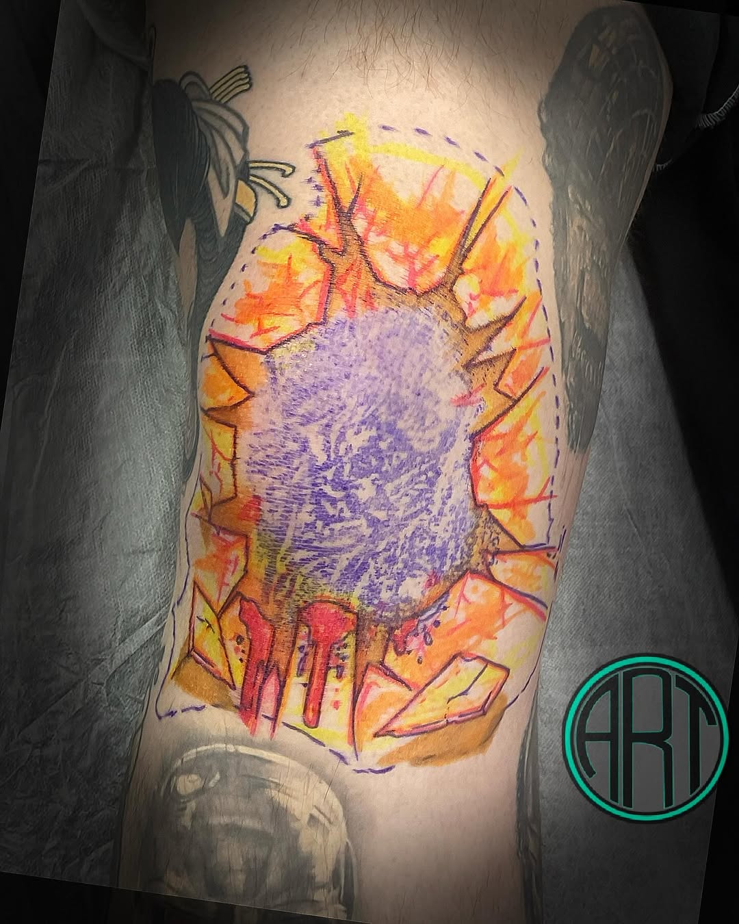 Vibrant watercolor core surrounded by jagged glass shards.