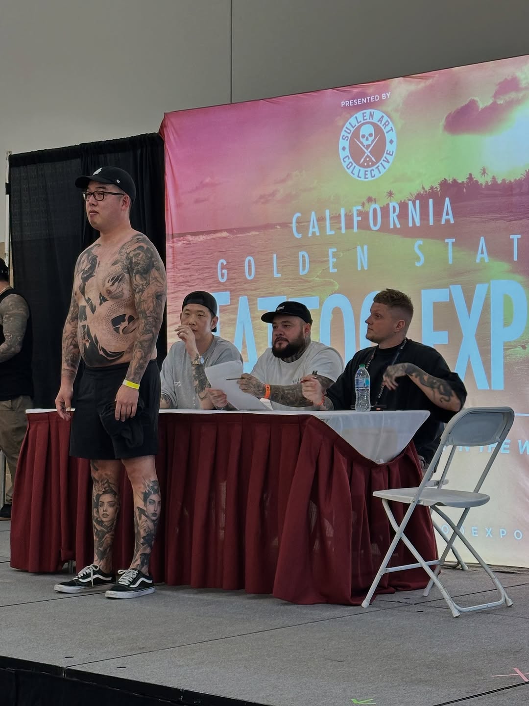 Dramatic full-sleeve and leg portraits on tattooed model