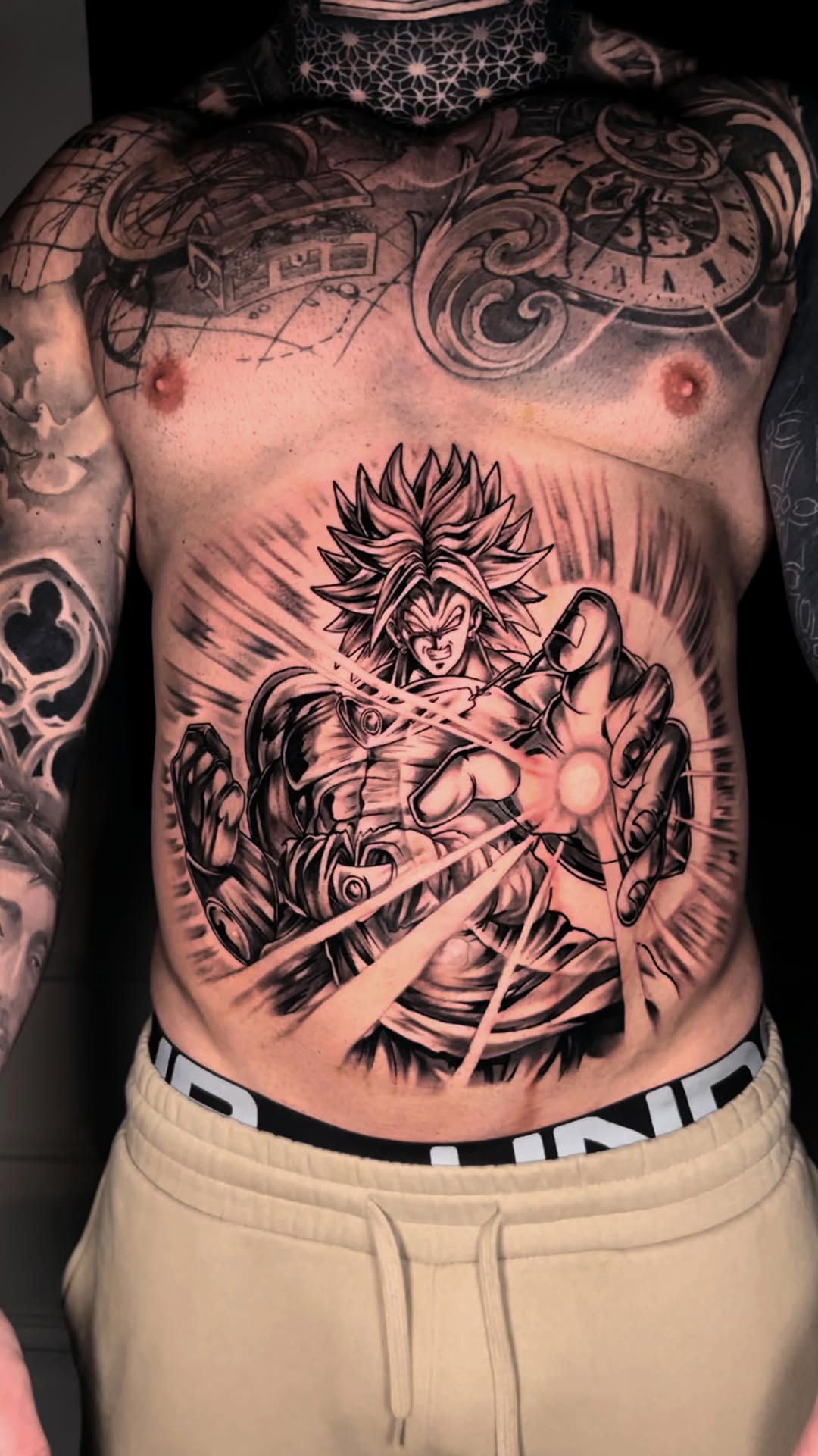 Broly-inspired Saiyan warrior in explosive black-and-gray style