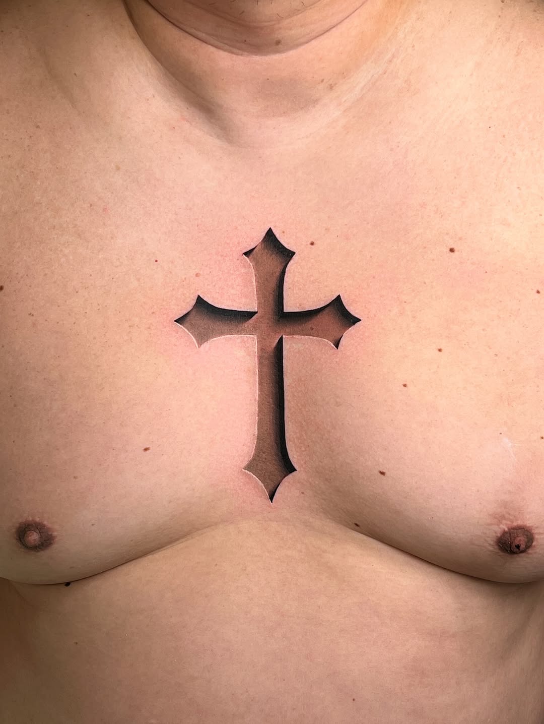 Bold engraved crucifix with beveled Gothic shading