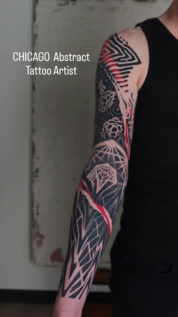 Monumental blackwork sleeve with jagged geometric patterns