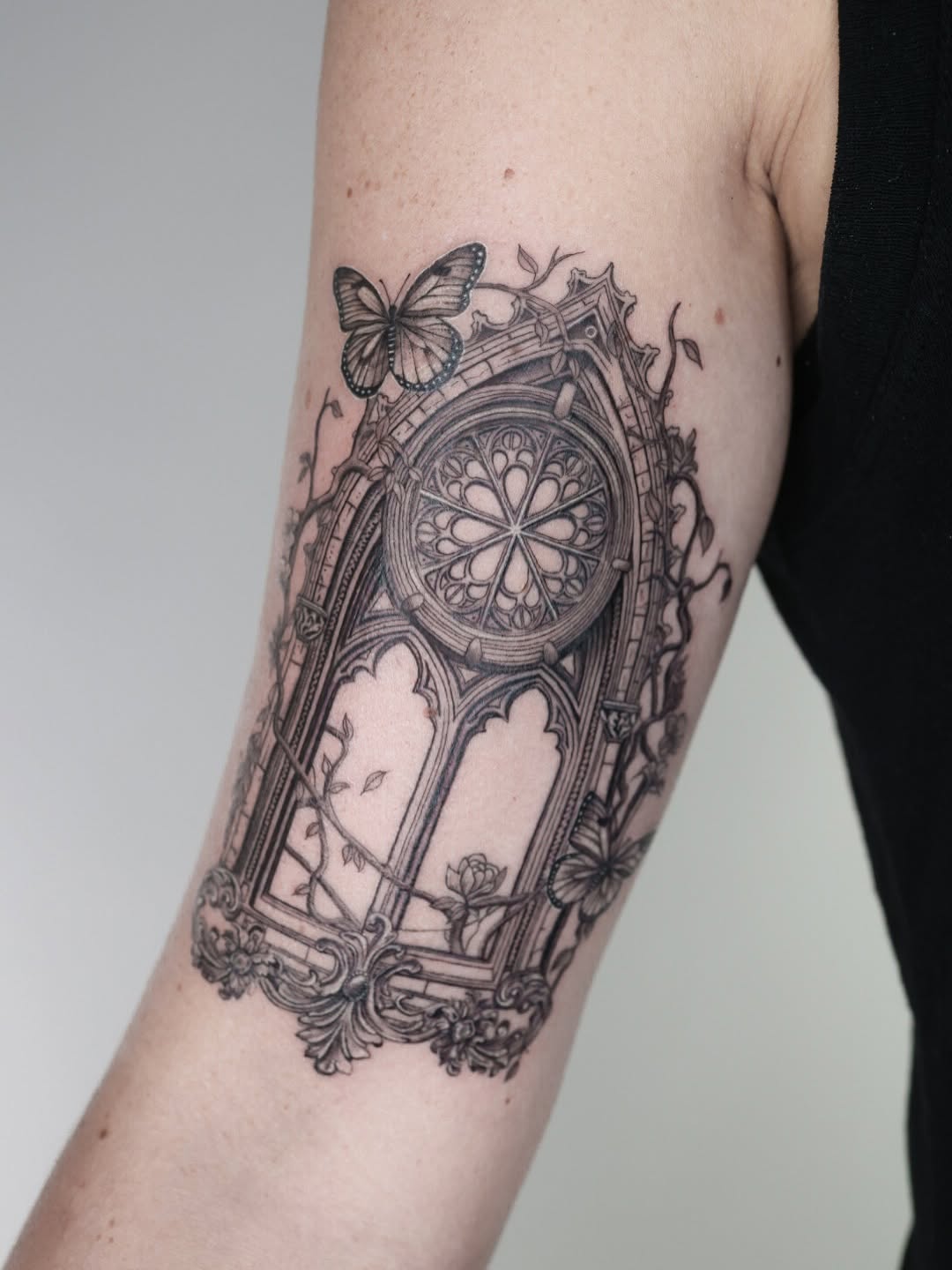 Intricate gothic cathedral window with delicate vines