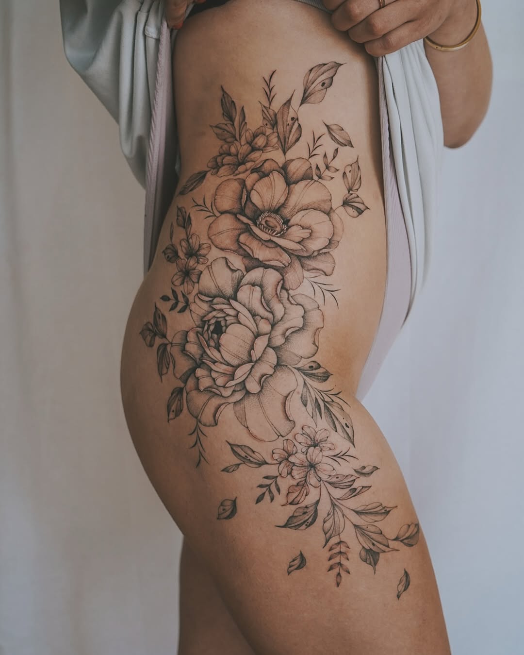 Elegant black-and-gray floral cascade with bold petal shading.