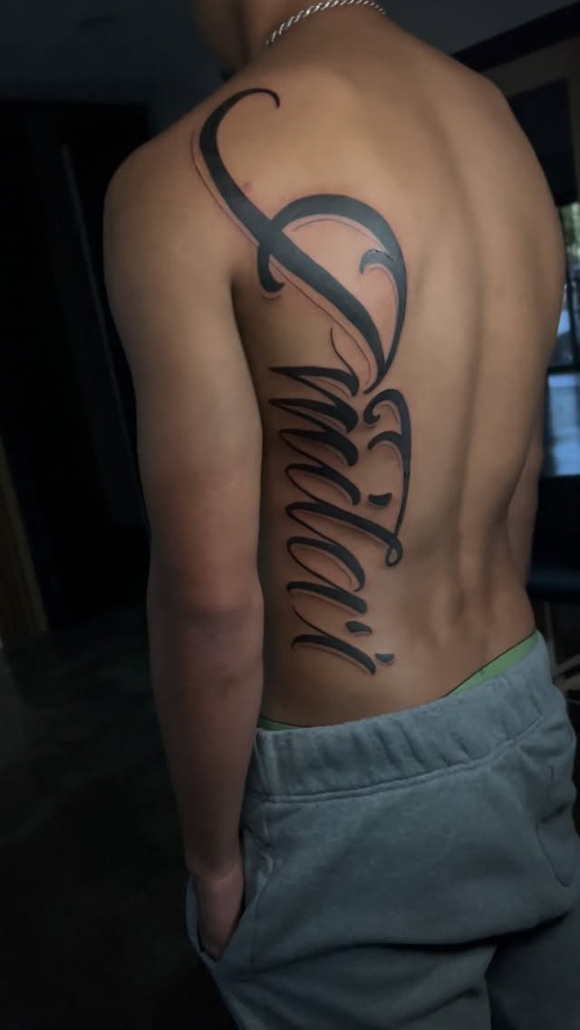 Elegant black script with flowing ornamental lettering along spine.