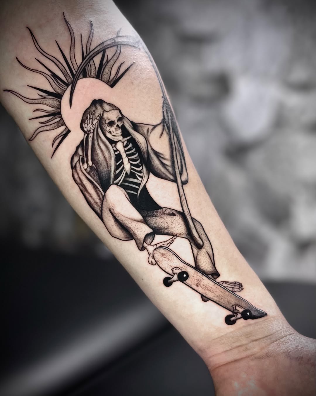 Grim reaper in hoodie skateboarding, bold black-and-gray illustration