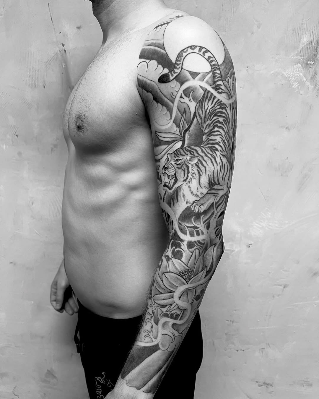 Tiger and moon sleeve tattoo