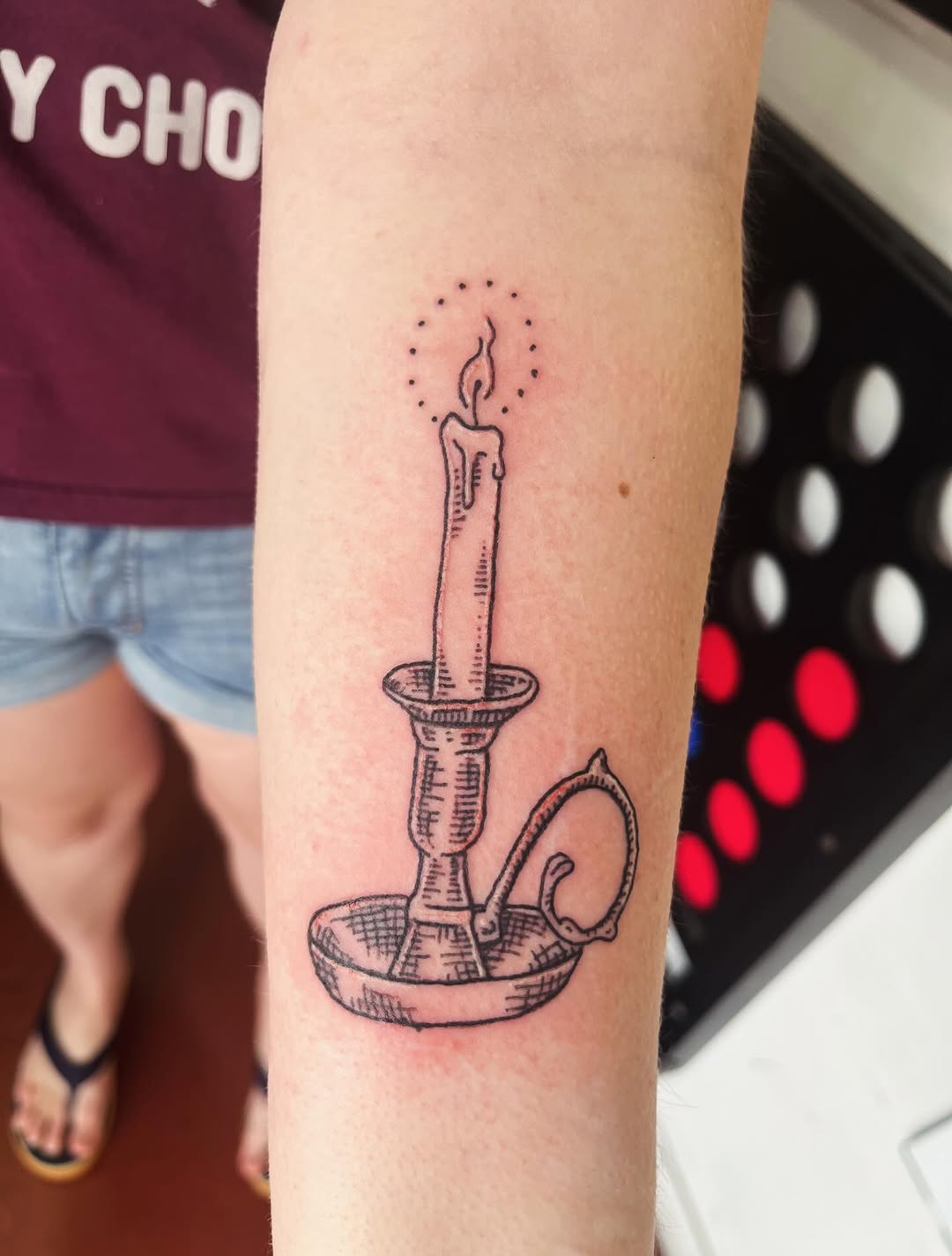 Bold linework memorial candle in a vintage candlestick