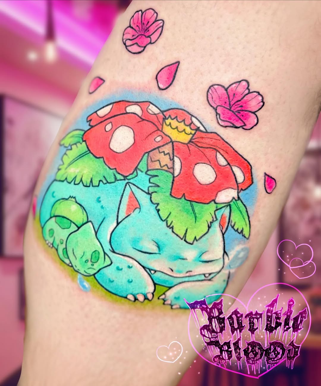 Vibrant cartoon Bulbasaur under red mushrooms, pink blossoms