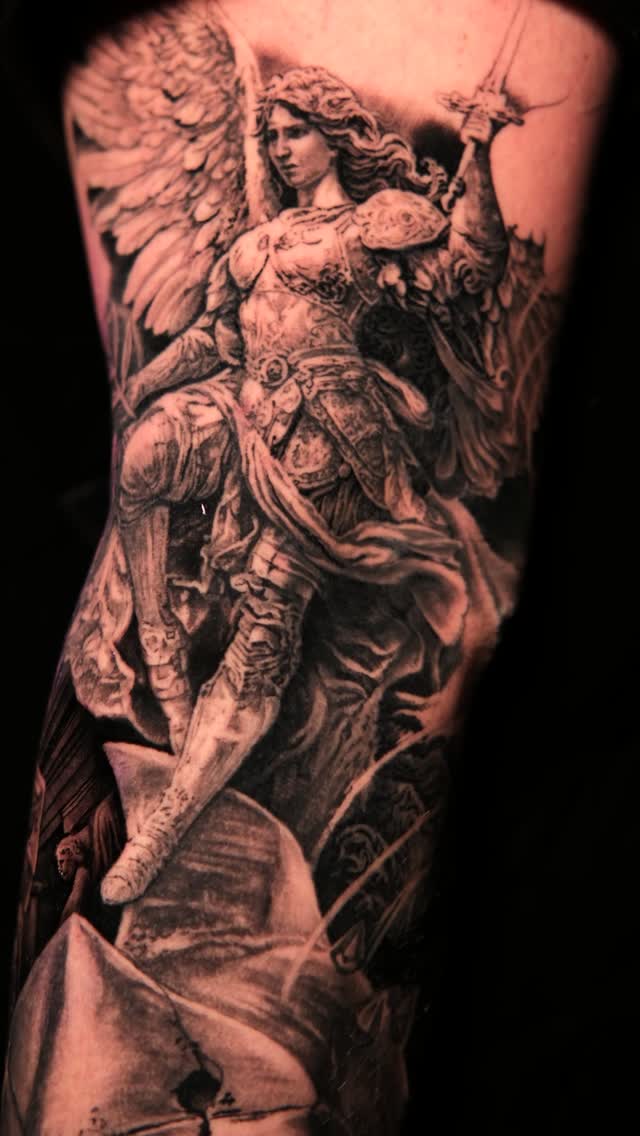 Hyper-detailed black-and-gray angel warrior with armored wings.
