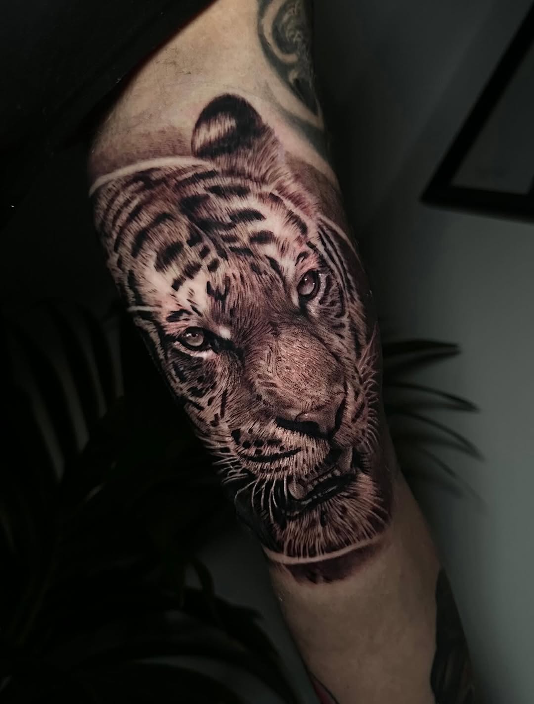 Hyper-realistic tiger head portrait in grayscale