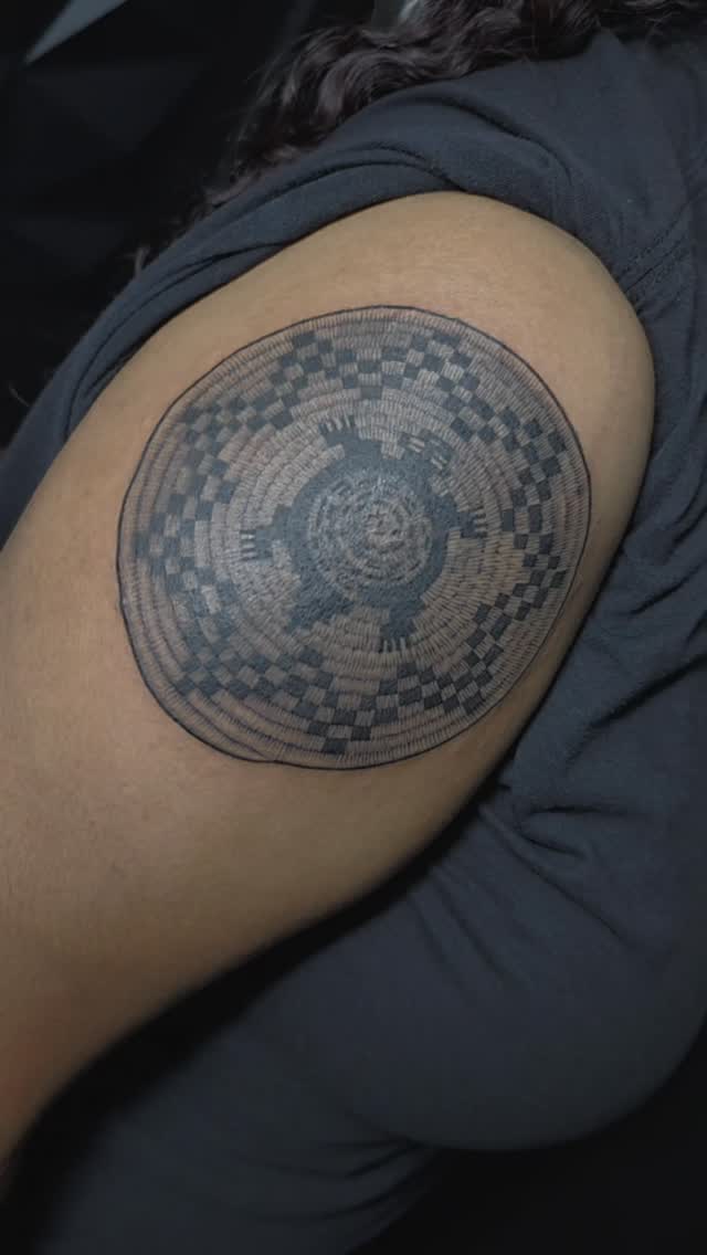 Intricate Hopi plaque-inspired circular tattoo with turtle motif