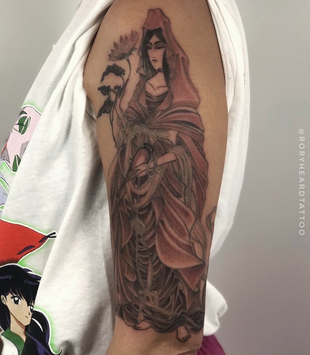 Japanese-inspired robed maiden with flowing fabric and flower