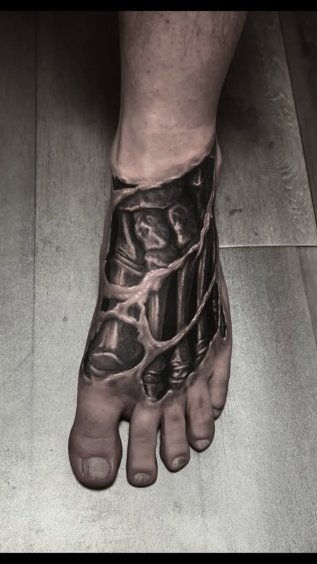 Hyper-detailed biomechanical forearm piece with skeletal textures